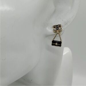 Chanel pierced earrings.